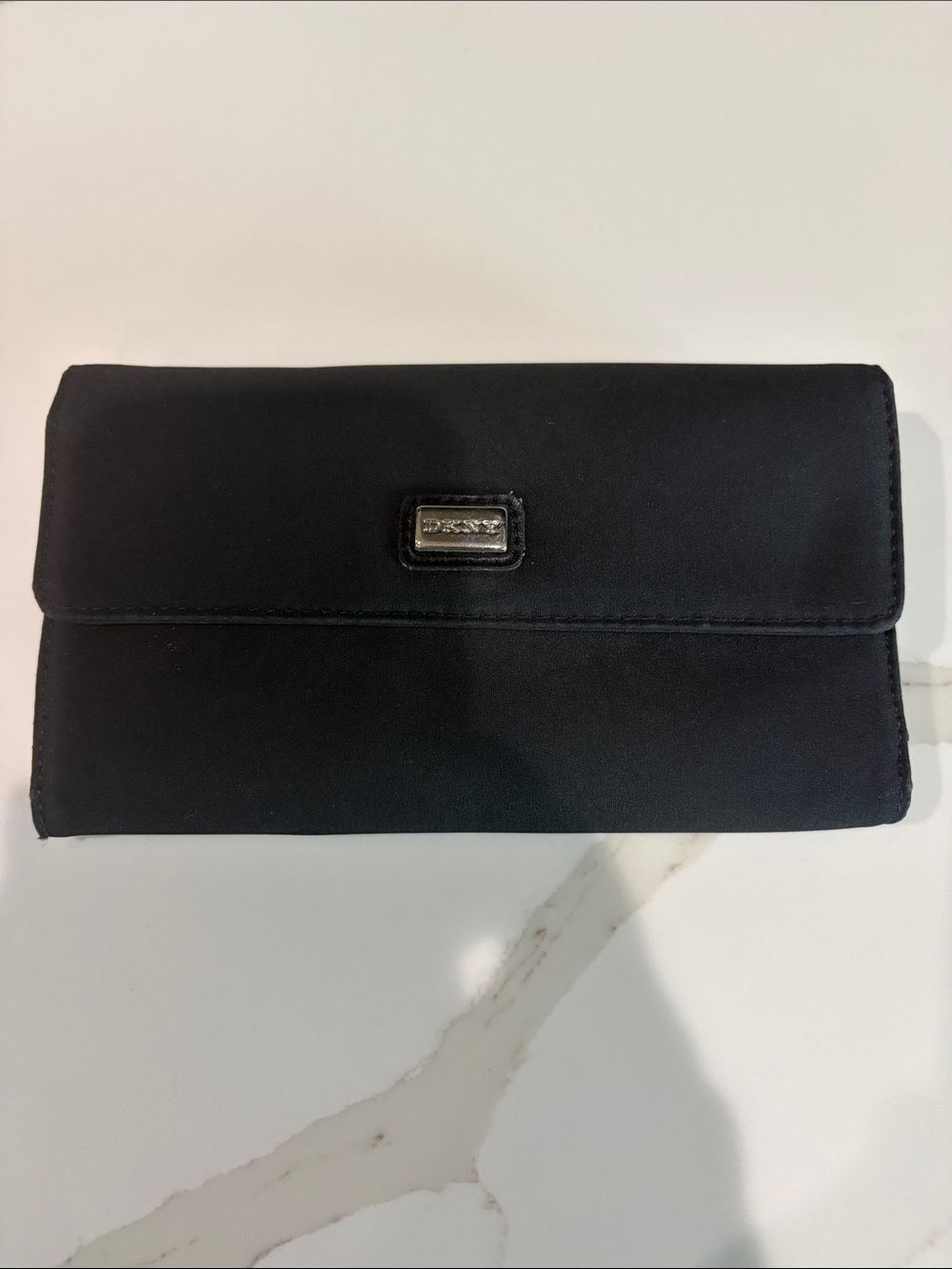 DKNY Black Fold-Over Clutch Wallet with Metal Logo